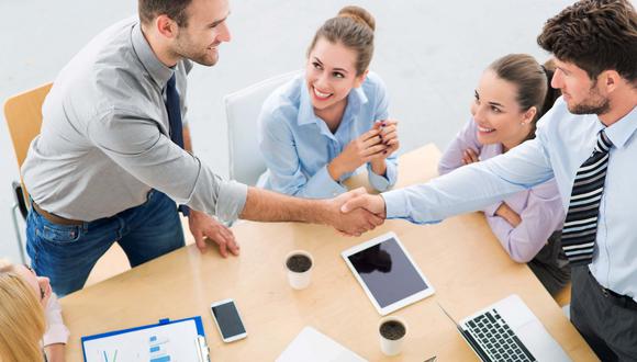 Conceptual image of businessteam working cohesively. Interaction and unity